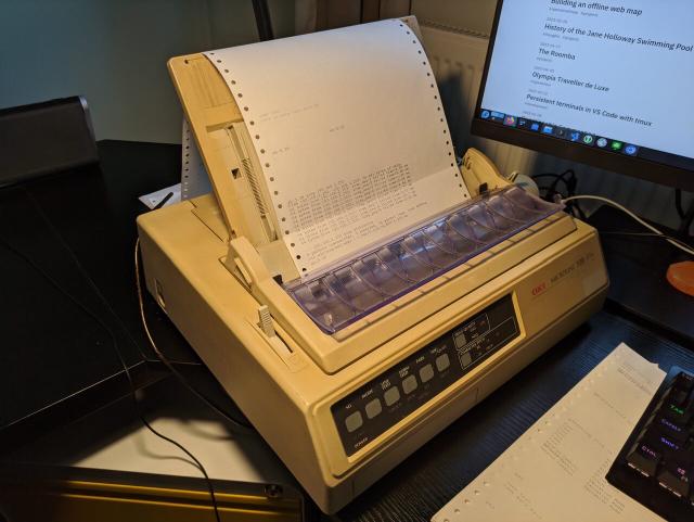 An Oki Microline 320 Elite dot matrix printer taking up all my desk space