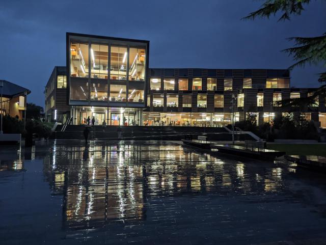 Emily Wilding Davison building at Royal Holloway, reflections in foreground